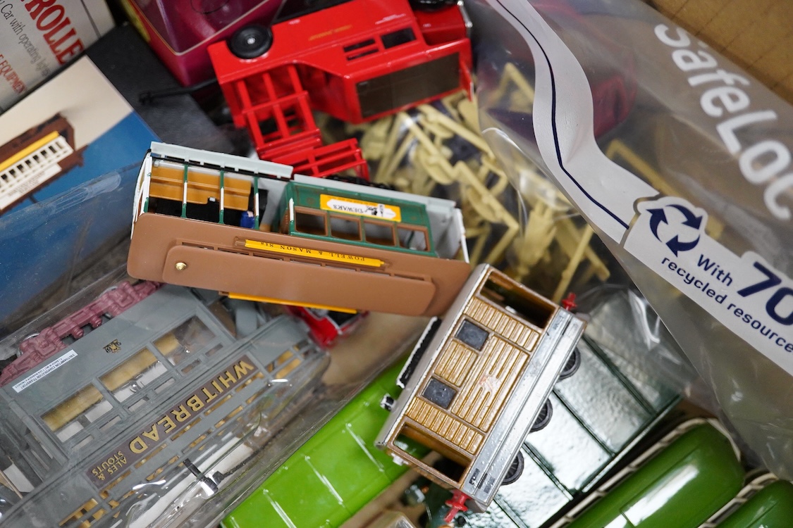 Sixty boxed diecast vehicles by Corgi Classics, Matchbox Models of Yesteryear, etc. including a large number of trams and other public transport vehicles, operators include; LCC, Plymouth, Blackpool, Belfast, Cardiff, et